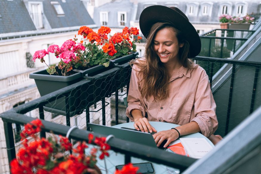 Women working from her balcony