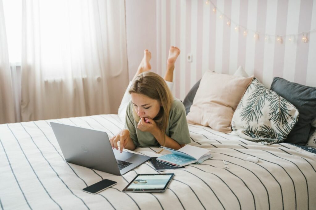 Women working from her bed